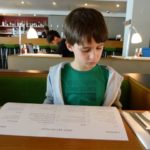 sam reads the menu at canteen at the royal festival hall southbank london