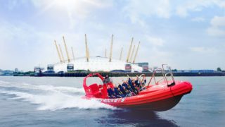 Thames Rocket speeding past the O2