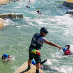 people swimming in the rapids Lee Valley
