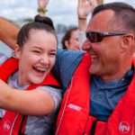 Dad and daughter enjoying their thames rocket boat tour