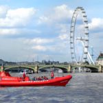 Thames rockets boat stationary near the London Eye