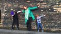 ginger mum amanda fulton dabs with two boys by wall