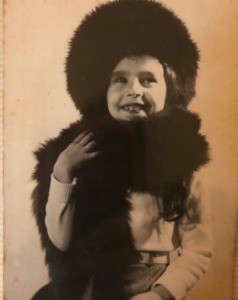 Julie Graham with hat and stole
