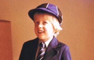 Marek Larwood as a kid in his school uniform