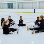 Kids sat on ice at Lee Valley Ice Centre