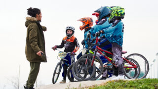 group of kids on the BMX pump track at Lee Valley Velopark
