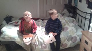 boys on bed at geffrye museum of the home london