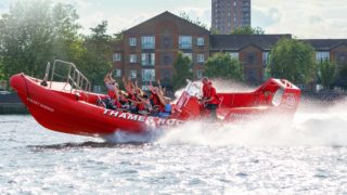 Red Thame rocket tour boat on the river