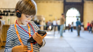 Boy with headphones in westminster