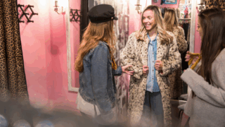 3 teen girls in shop changing rooms