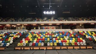 Multicoloured folding seats inside the Copper Box Arena looking like LEGO