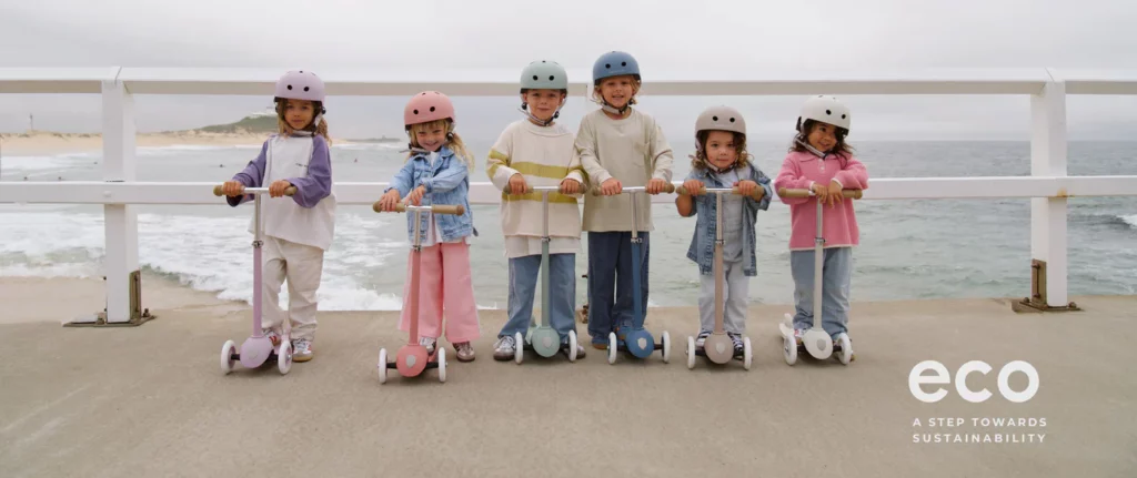 Group of children all with banwood scooters