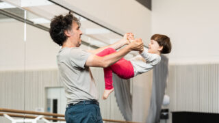 Dad and child doing Rambert dance class