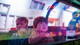 2 children and reflections on Mail Rail at the Postal Museum